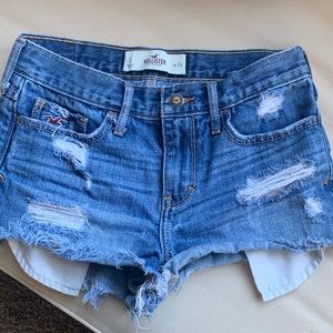 Hollister denim shorts size 24.  Frayed bottom. Wore once.